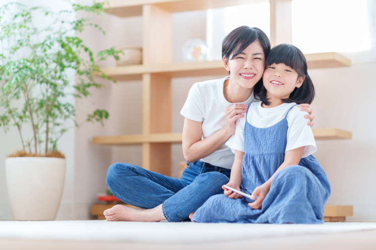 虫歯を予防し笑顔になる親子